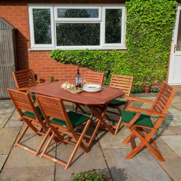 rowlinson plumley 6 seater hardwood dining set with grey cushions